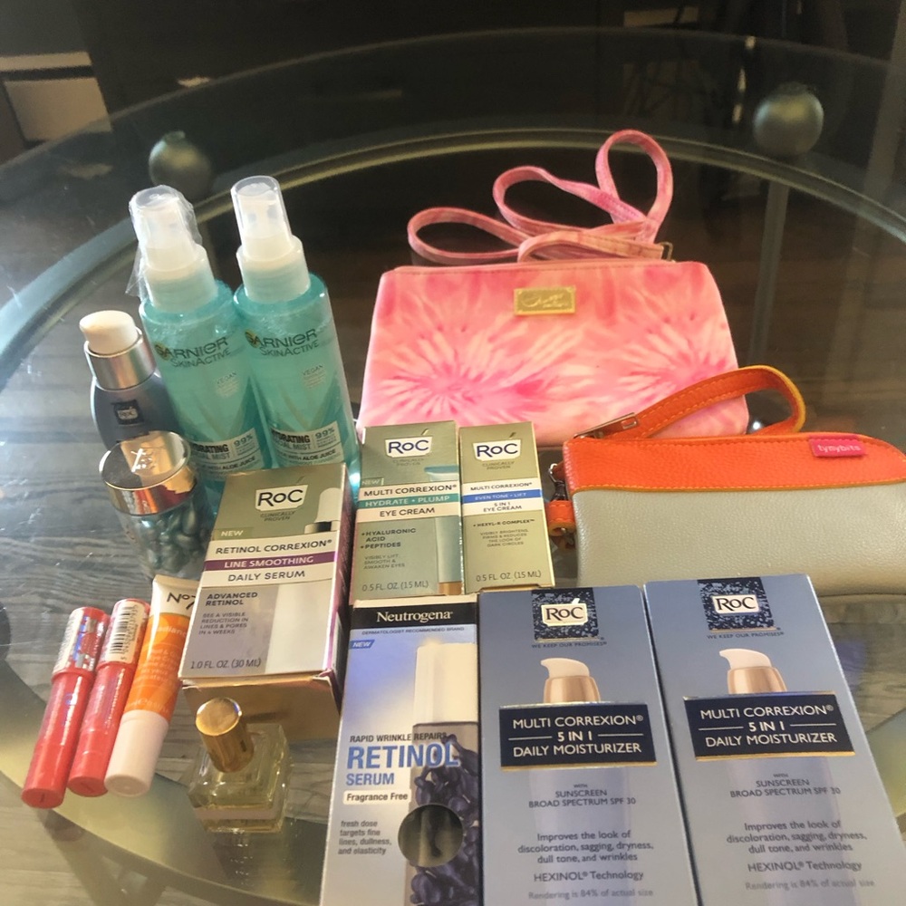 BRAND NEW SEVENTEEN , PIECE BUNDLE!!! ROC SKINCARE & DEFINE ME PERFUME PURSES,